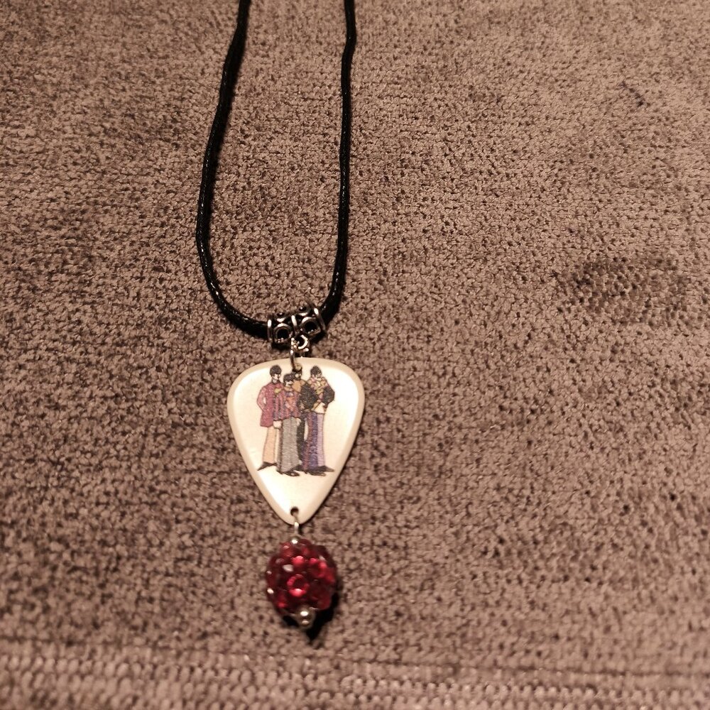 THE BEATLES GROUP GUITAR PICK NECKLACE